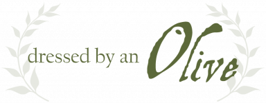 Dressed By An Olive logo