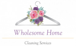 Wholesome Home Cleaning Services logo